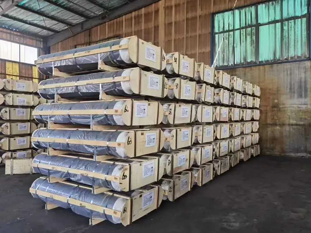 Packed graphite electrode stock in warehouse